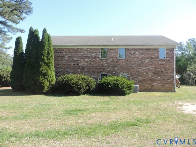 102 Hicks Lane Rice, VA 23966 - Photo 4 of 26 a front view of a house with a yard