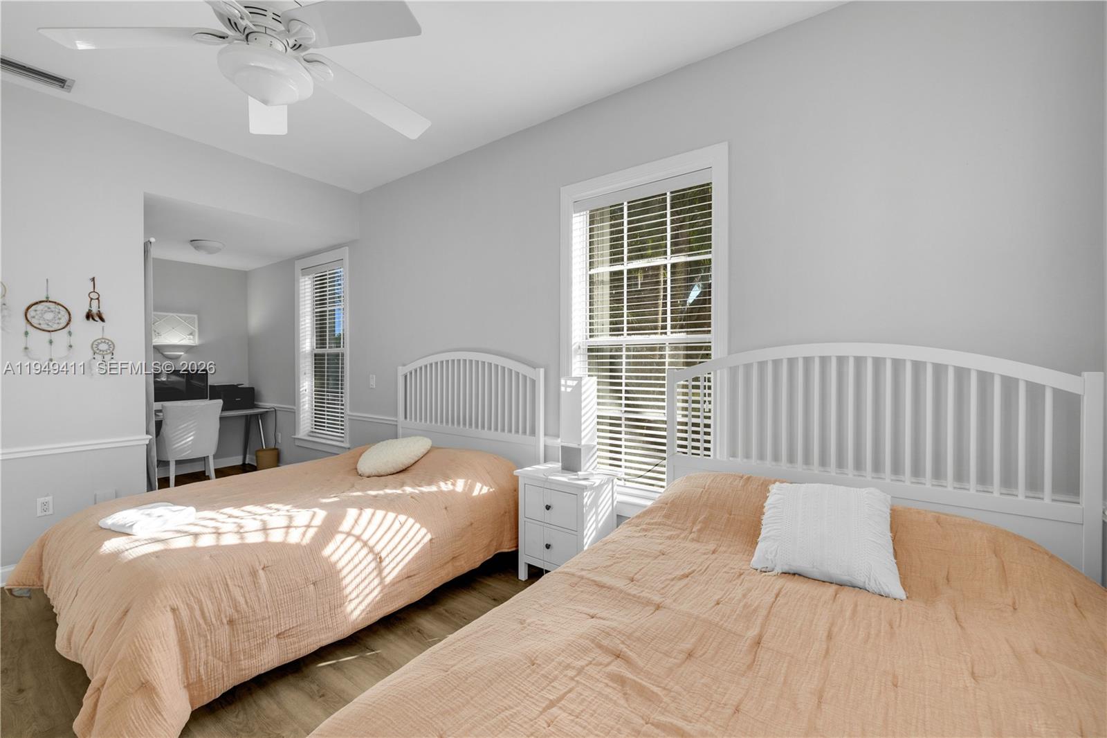 27950 Southwest 182nd Avenue Homestead, FL 33031 - Photo 16 of 49 a bedroom with a bed and a window