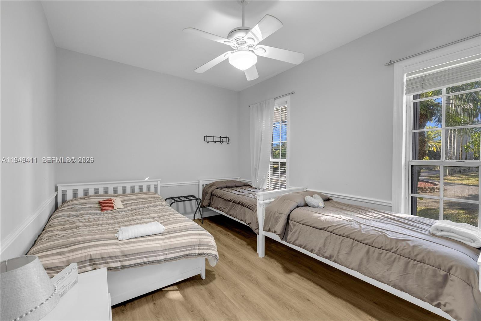 27950 Southwest 182nd Avenue Homestead, FL 33031 - Photo 20 of 49 a bedroom with a bed and a window