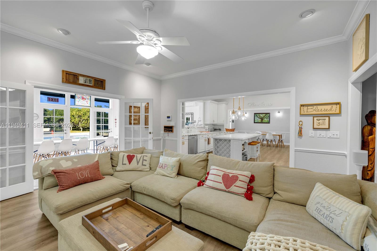 27950 Southwest 182nd Avenue Homestead, FL 33031 - Photo 25 of 49 a living room with furniture and a large window
