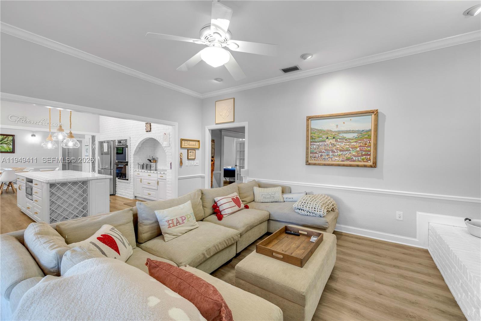 27950 Southwest 182nd Avenue Homestead, FL 33031 - Photo 26 of 49 a living room with furniture and wooden floor