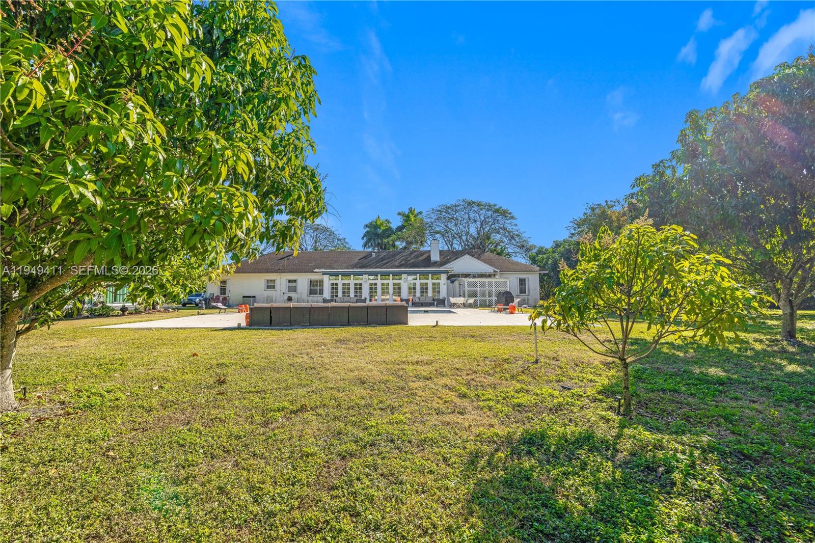 27950 Southwest 182nd Avenue Homestead, FL 33031 - Photo 41 of 49 a view of a swimming pool with an ocean view
