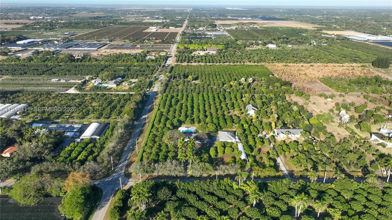 27950 Southwest 182nd Avenue Homestead, FL 33031 - Photo 49 of 49 an aerial view of residential houses with outdoor space