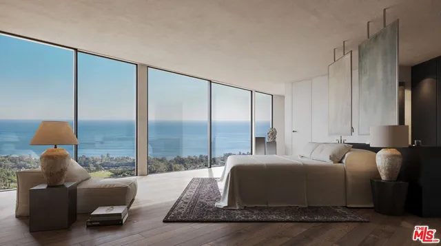 a bedroom with a bed and a large window