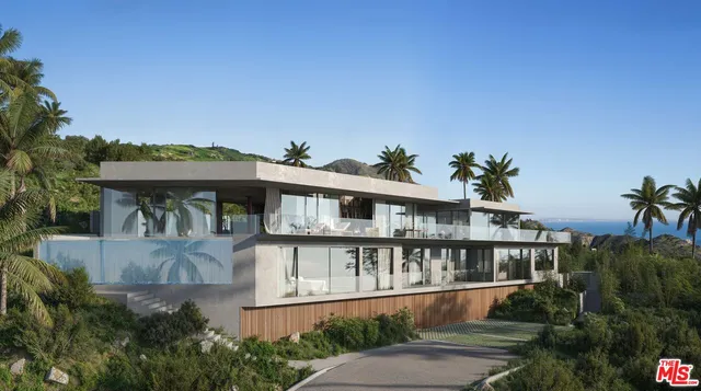 a view of a house with yard and plants
