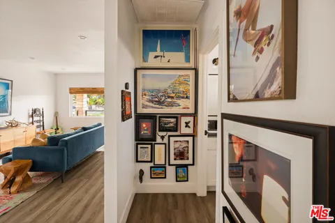 a kitchen with stainless steel appliances granite countertop a refrigerator and a stove