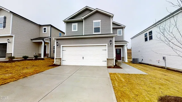 a view of a house with a swimming pool