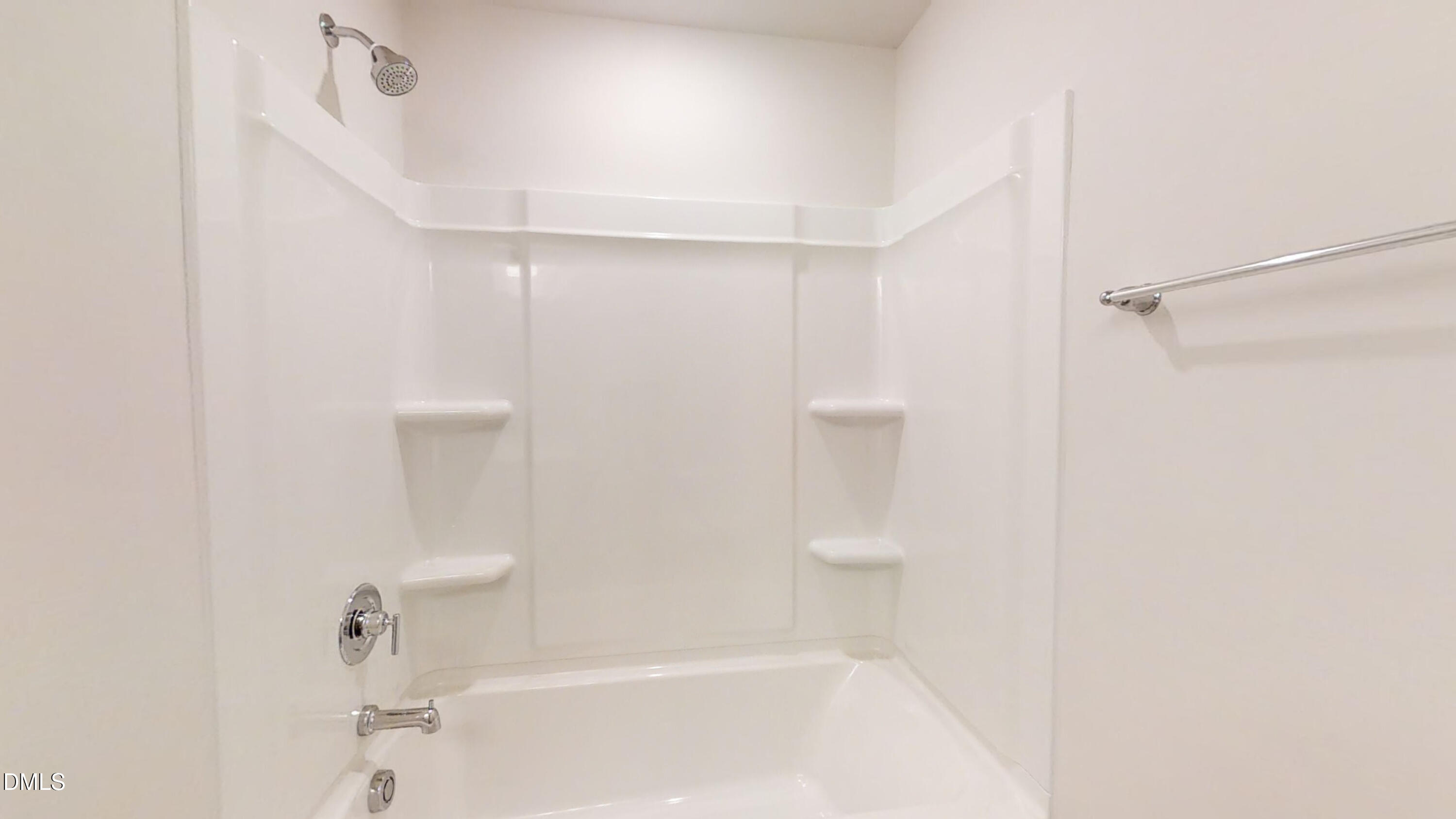 46 Coffee Tree Circle Clayton, NC 27527 - Photo 25 of 46 a bathroom with a shower