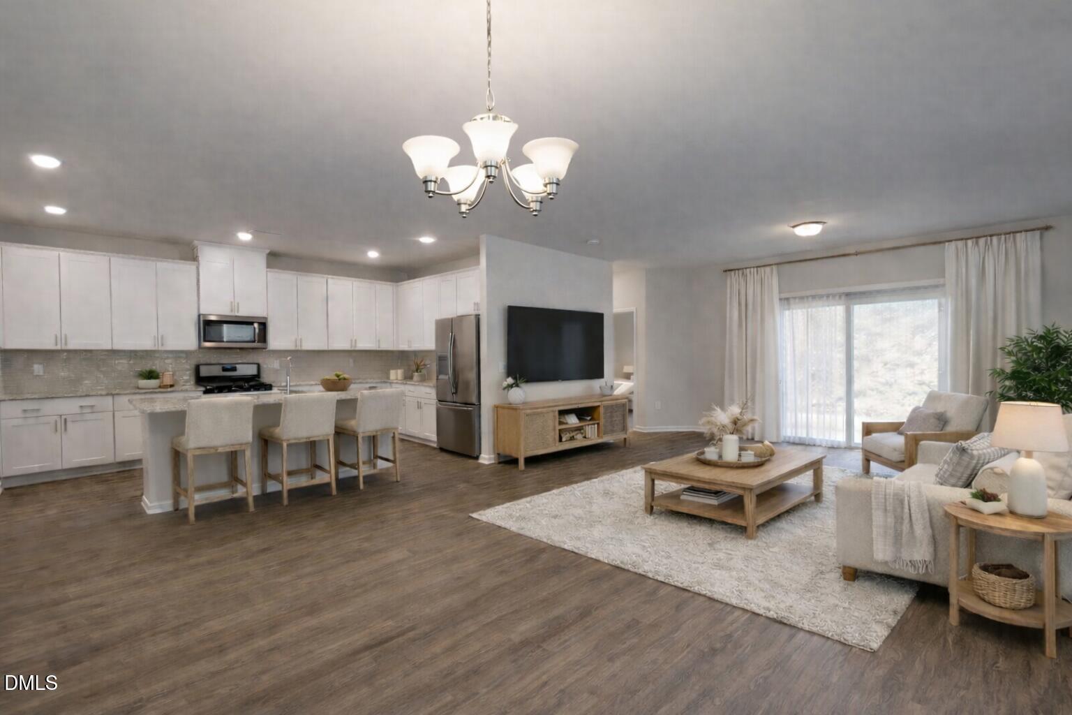 46 Coffee Tree Circle Clayton, NC 27527 - Photo 4 of 46 a living room with furniture kitchen view and a window