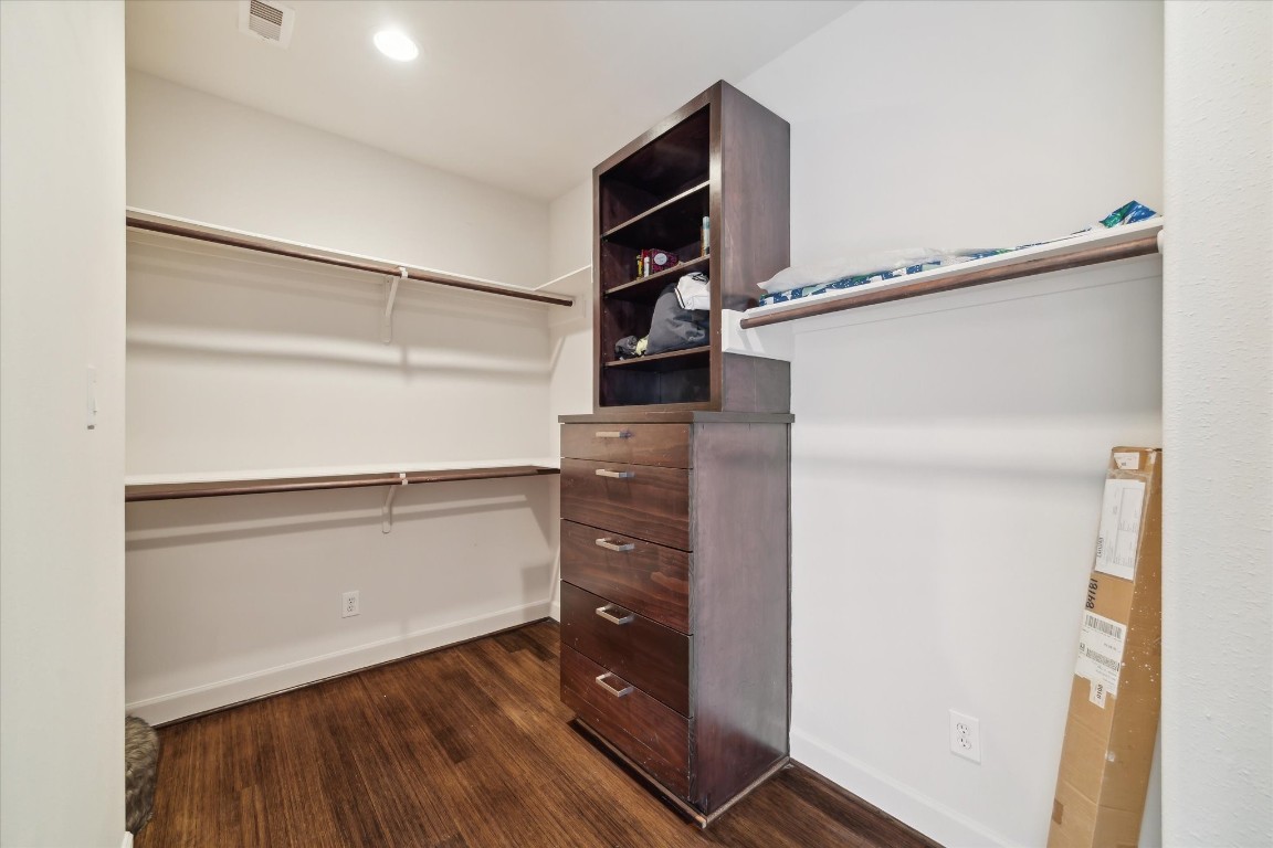 3041 Clinton Drive Houston, TX 77020 - Photo 19 of 29 a view of walk in closet with empty racks