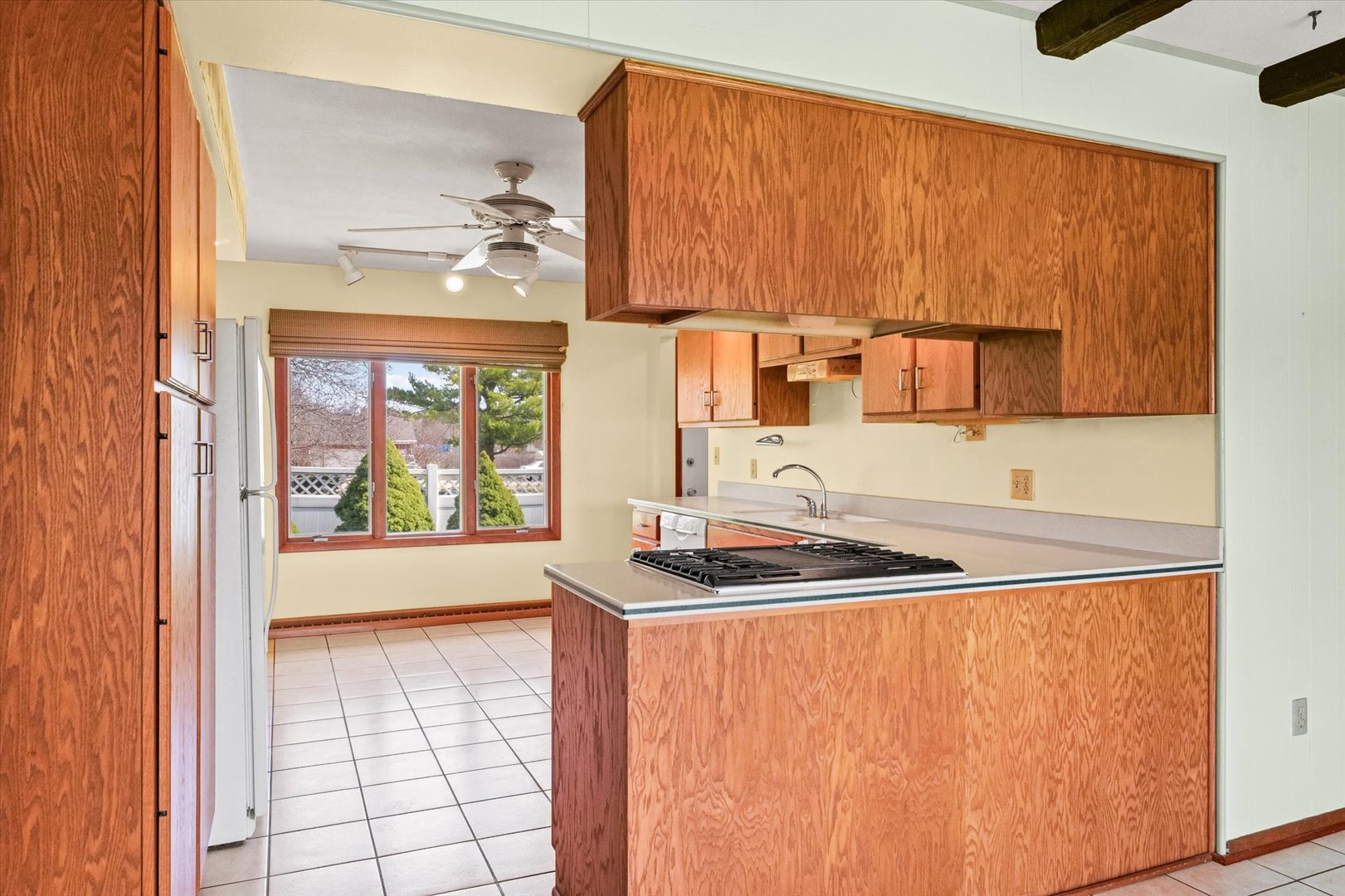 510 Parker Place Rantoul, IL 61866 - Photo 11 of 33 a kitchen with granite countertop a sink and a window