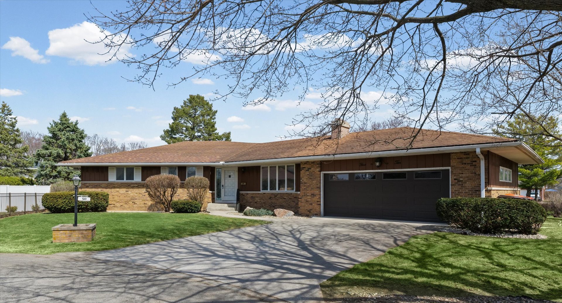 510 Parker Place Rantoul, IL 61866 - Photo 2 of 33 a front view of a house with a yard and garage