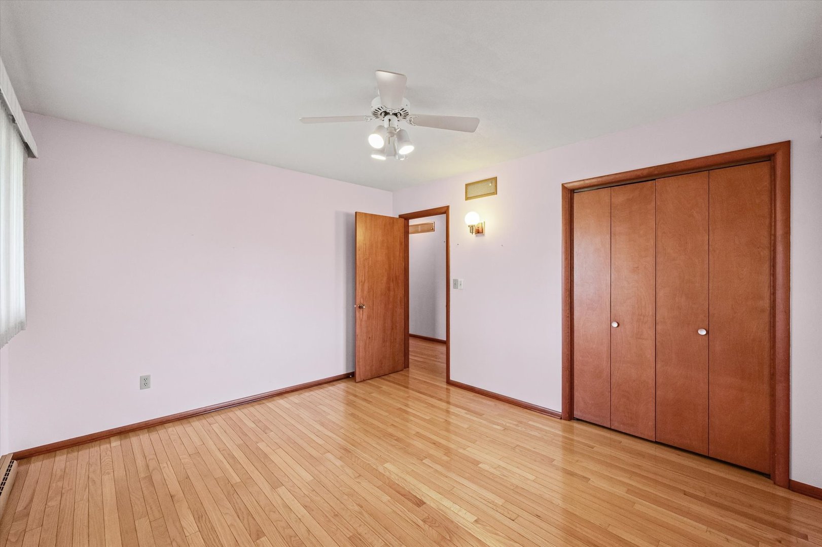 510 Parker Place Rantoul, IL 61866 - Photo 22 of 33 a view of an empty room with wooden floor