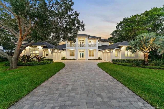 a view of house with a yard