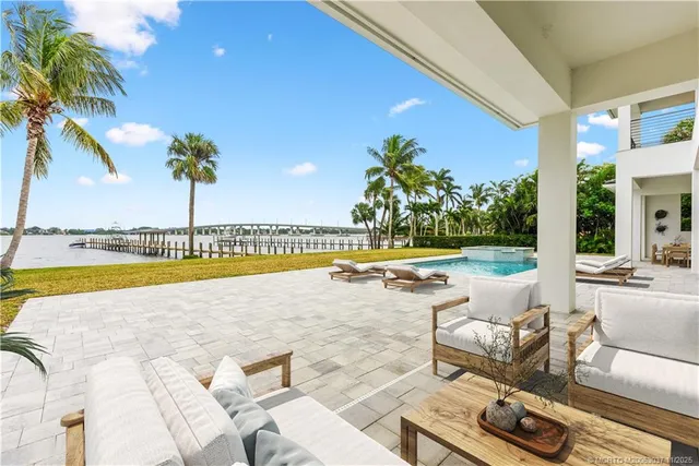 a view of a swimming pool with a patio