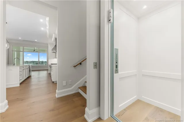 a view of a kitchen cabinets and wooden floor