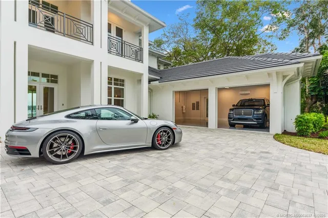 a car parked in front of a house