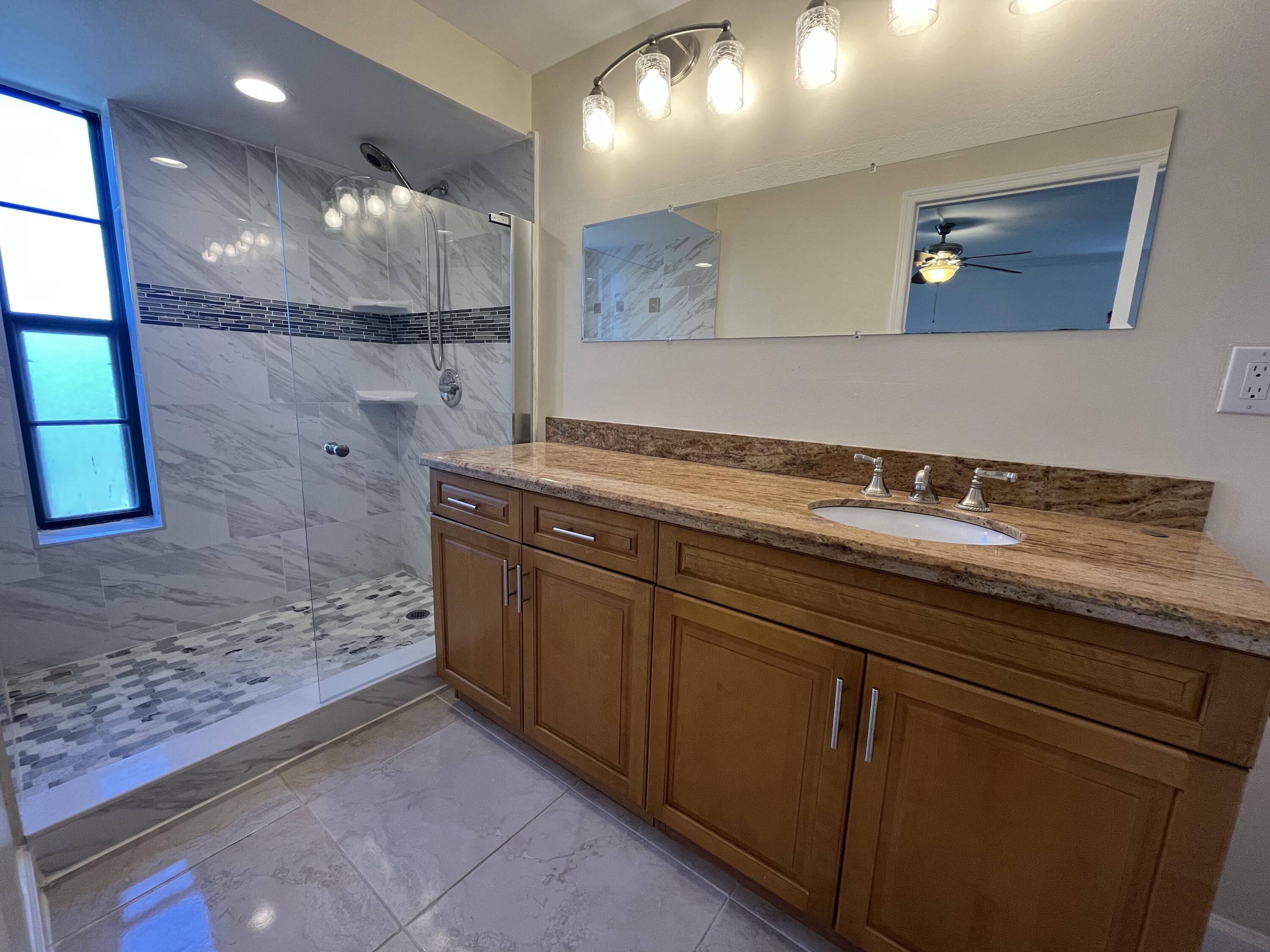 9300 Southwest 8th Street, Unit 301 Boca Raton, FL 33428 - Photo 16 of 27 a view of a counter top space