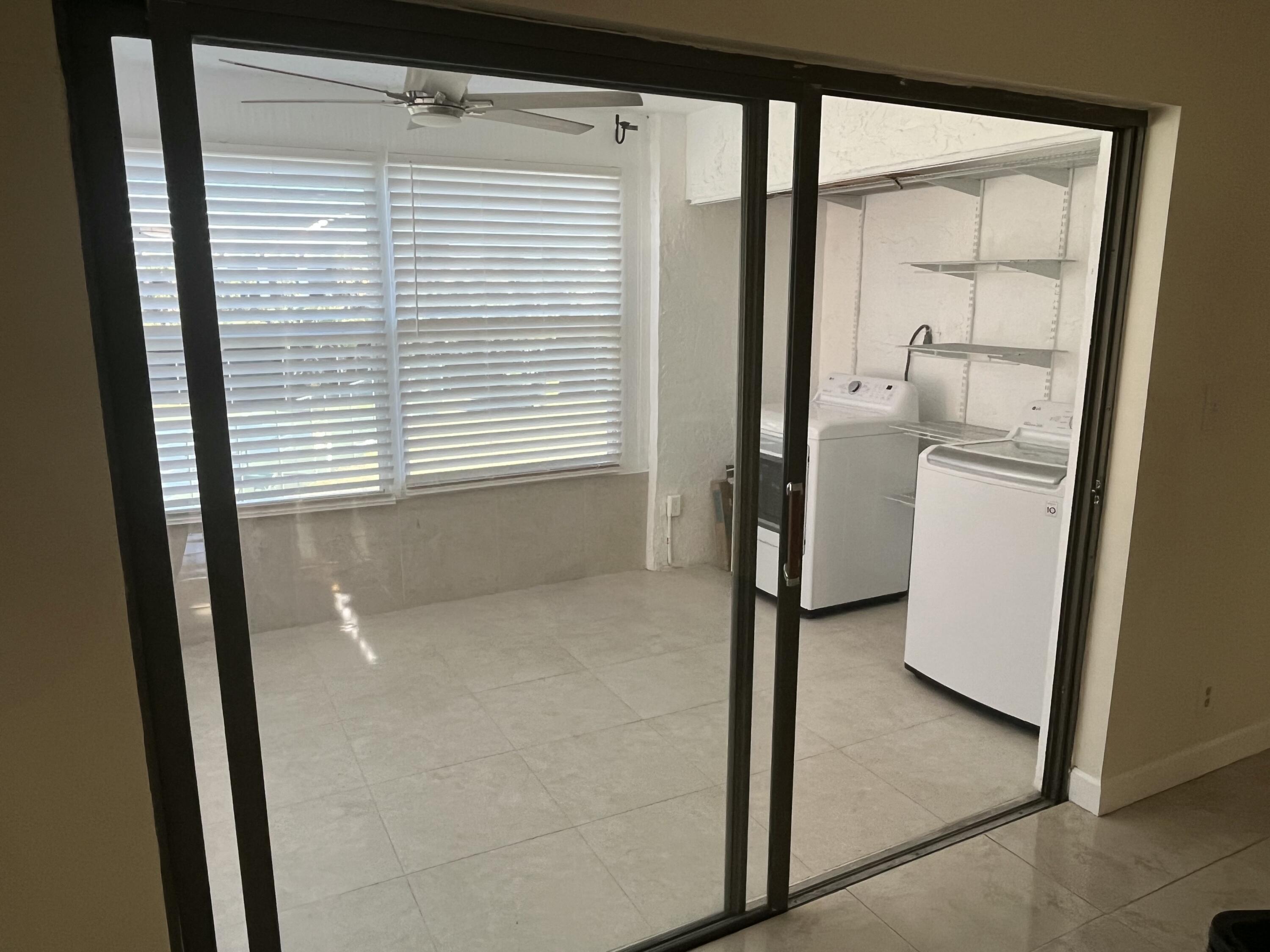 9300 Southwest 8th Street, Unit 301 Boca Raton, FL 33428 - Photo 21 of 27 a view of a storage & utility room