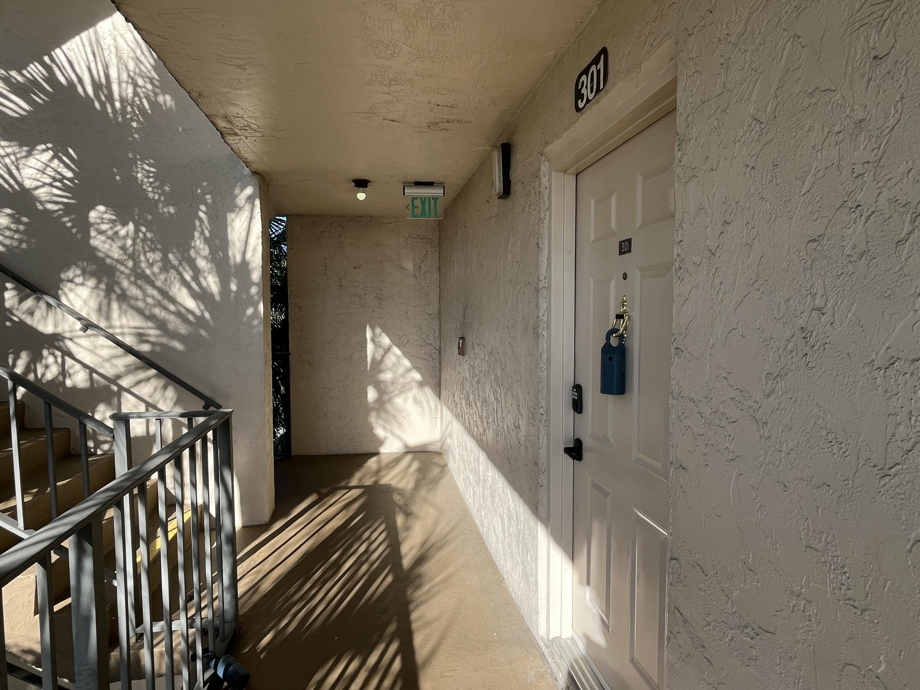 9300 Southwest 8th Street, Unit 301 Boca Raton, FL 33428 - Photo 25 of 27 a view of a staircase