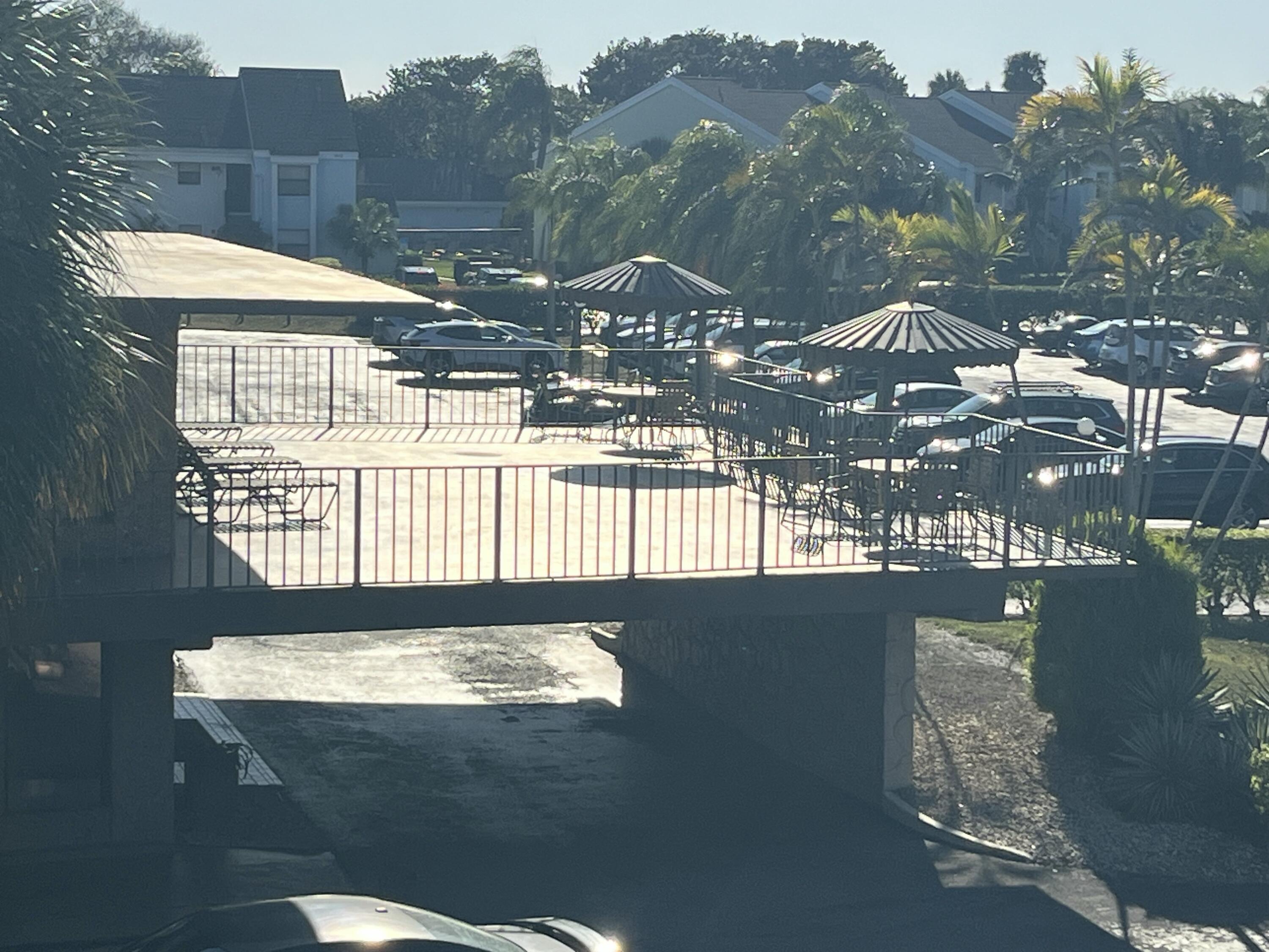 9300 Southwest 8th Street, Unit 301 Boca Raton, FL 33428 - Photo 26 of 27 a view of balcony and patio