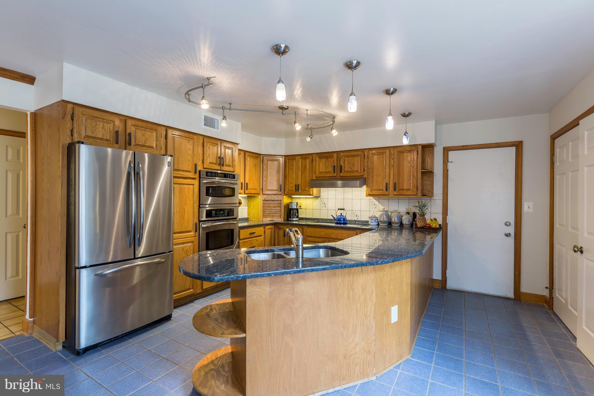 1942 High Ridge Road Annapolis, MD 21409 - Photo 14 of 30 Upgraded Stainless Appliances- Door to garage