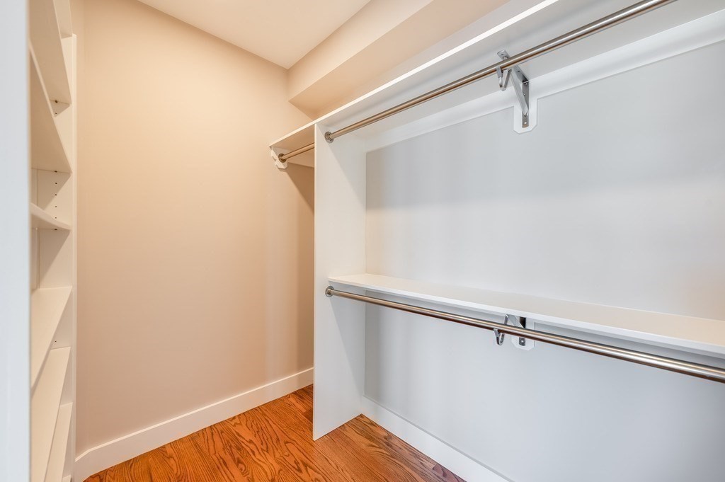 8 Riverside Road Gloucester, MA 01930 - Photo 21 of 40 a view of walk in closet with empty racks