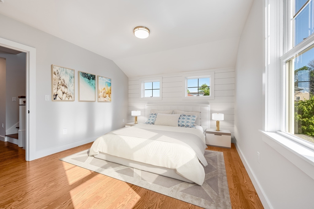 8 Riverside Road Gloucester, MA 01930 - Photo 23 of 40 a bedroom with a bed and a window