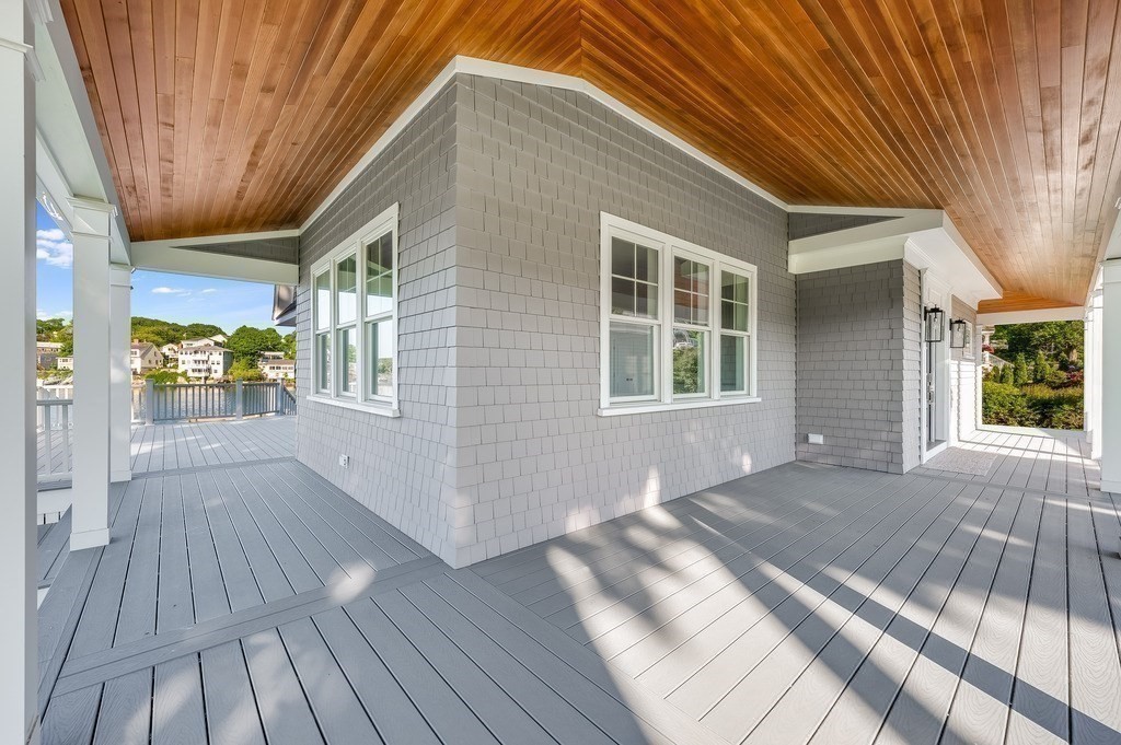 8 Riverside Road Gloucester, MA 01930 - Photo 31 of 40 a view of backyard with a deck and wooden floor