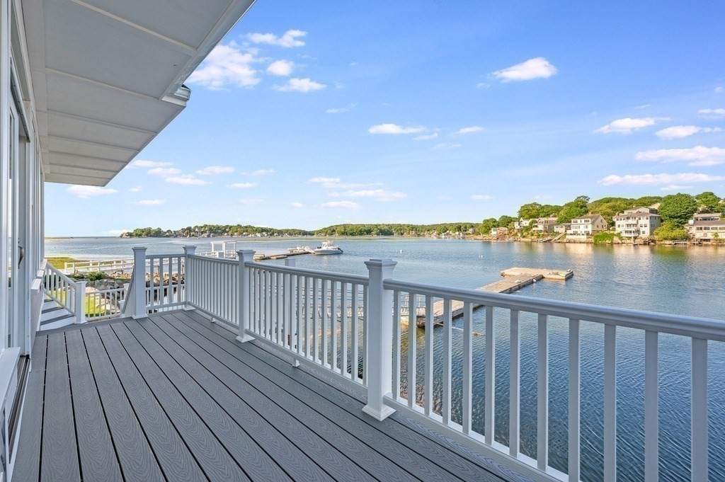 8 Riverside Road Gloucester, MA 01930 - Photo 33 of 40 a balcony with wooden floor and city view