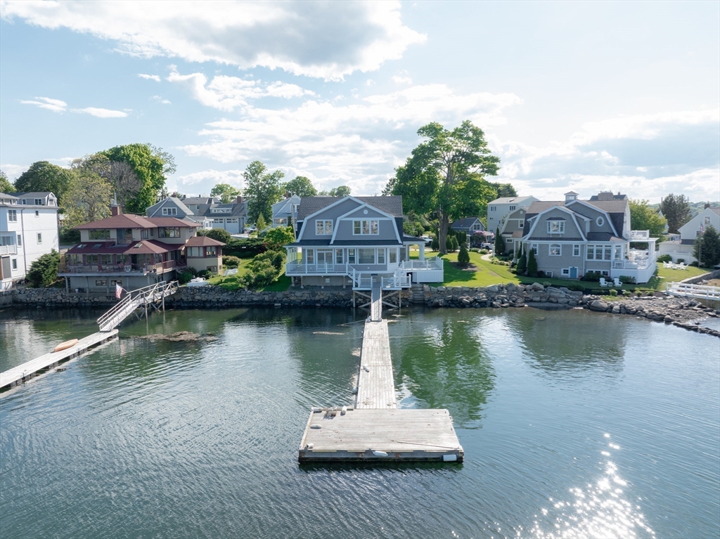 8 Riverside Road Gloucester, MA 01930 - Photo 38 of 40 a view of a lake with a city