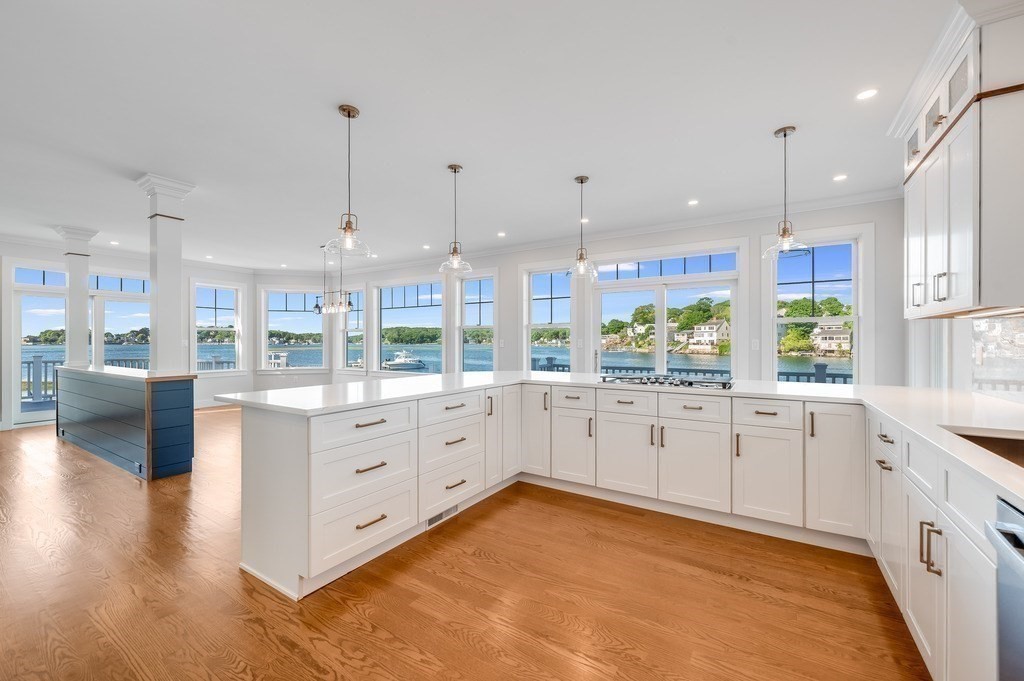 8 Riverside Road Gloucester, MA 01930 - Photo 7 of 40 a large white kitchen with a large window