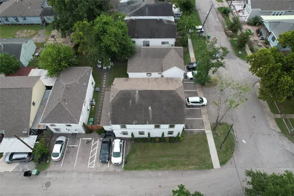 an aerial view of a house with a garden