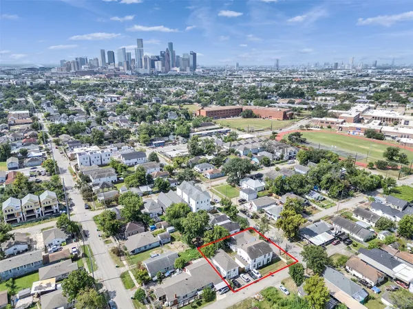 an aerial view of a city with lots of residential buildings