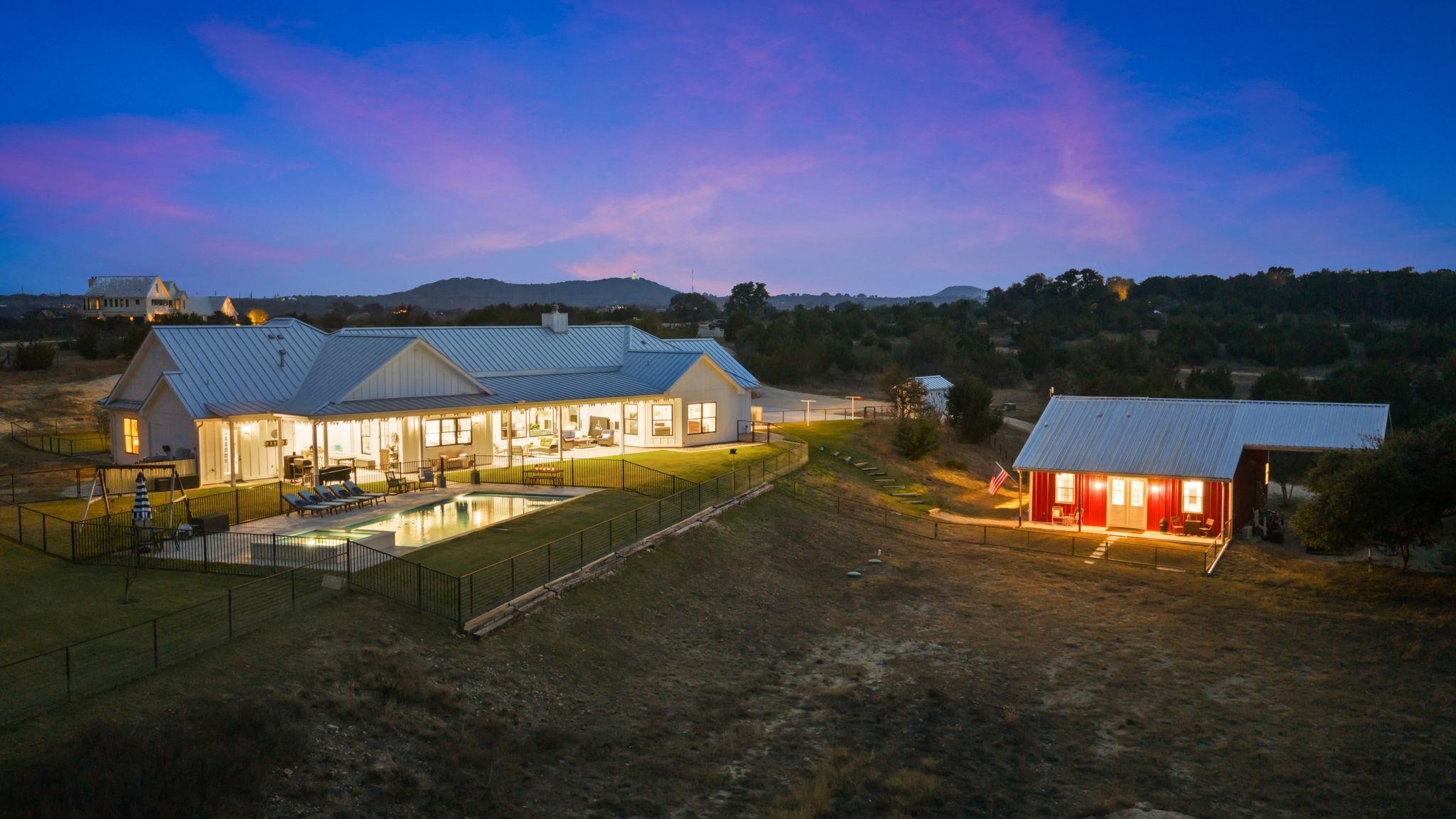 452 Southwick Ranch Road Johnson City, TX 78636 - Photo 25 of 30 a view of a city with sunset view