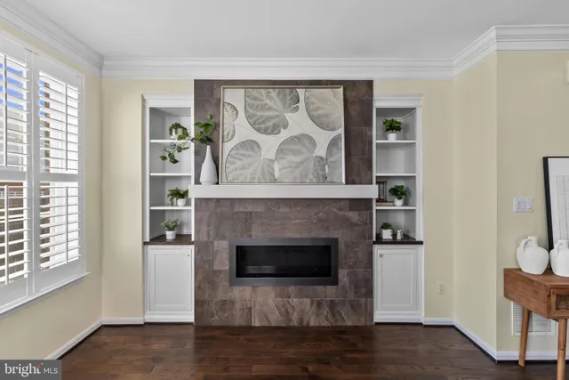 a view of dining room with furniture window and wooden floor