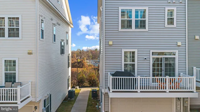 a picture of a bench in front of a wall