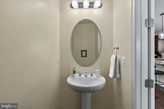 a view of entryway with livingroom and wooden floor