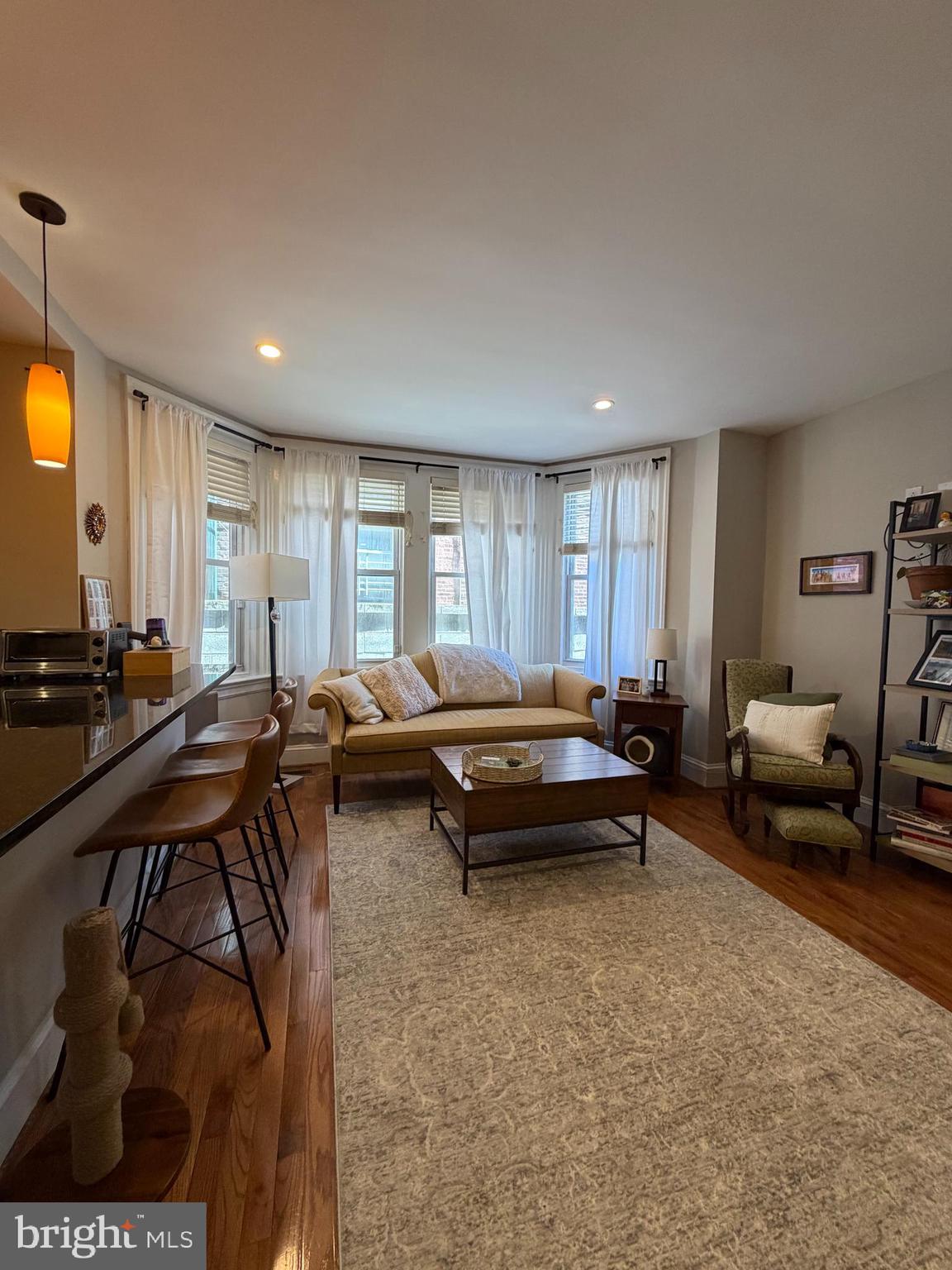 1820 Pine Street, Unit 1R Philadelphia, PA 19103 - Photo 2 of 17 a living room with furniture and a couch