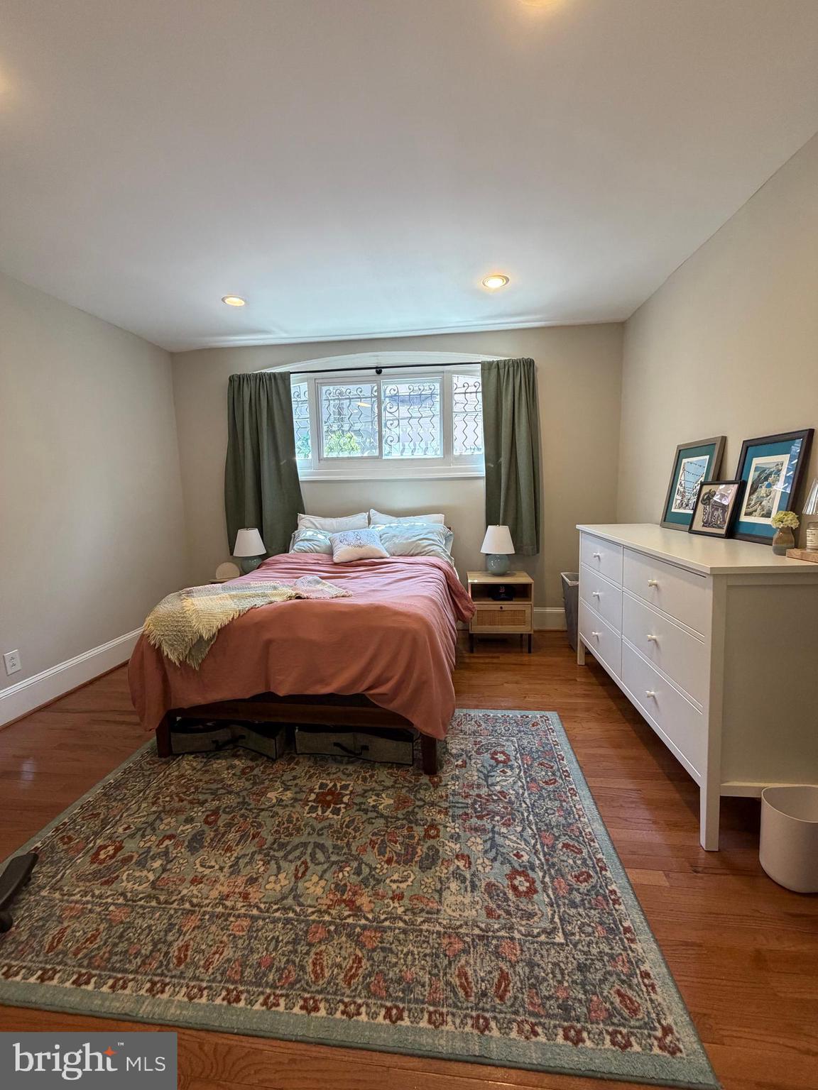 1820 Pine Street, Unit 1R Philadelphia, PA 19103 - Photo 9 of 17 a bedroom with a bed and window