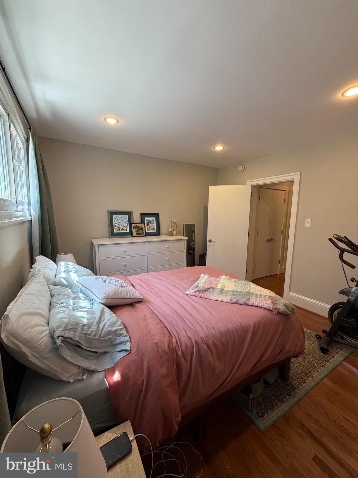 1820 Pine Street, Unit 1R Philadelphia, PA 19103 - Photo 10 of 17 a bedroom with a bed and wooden floor
