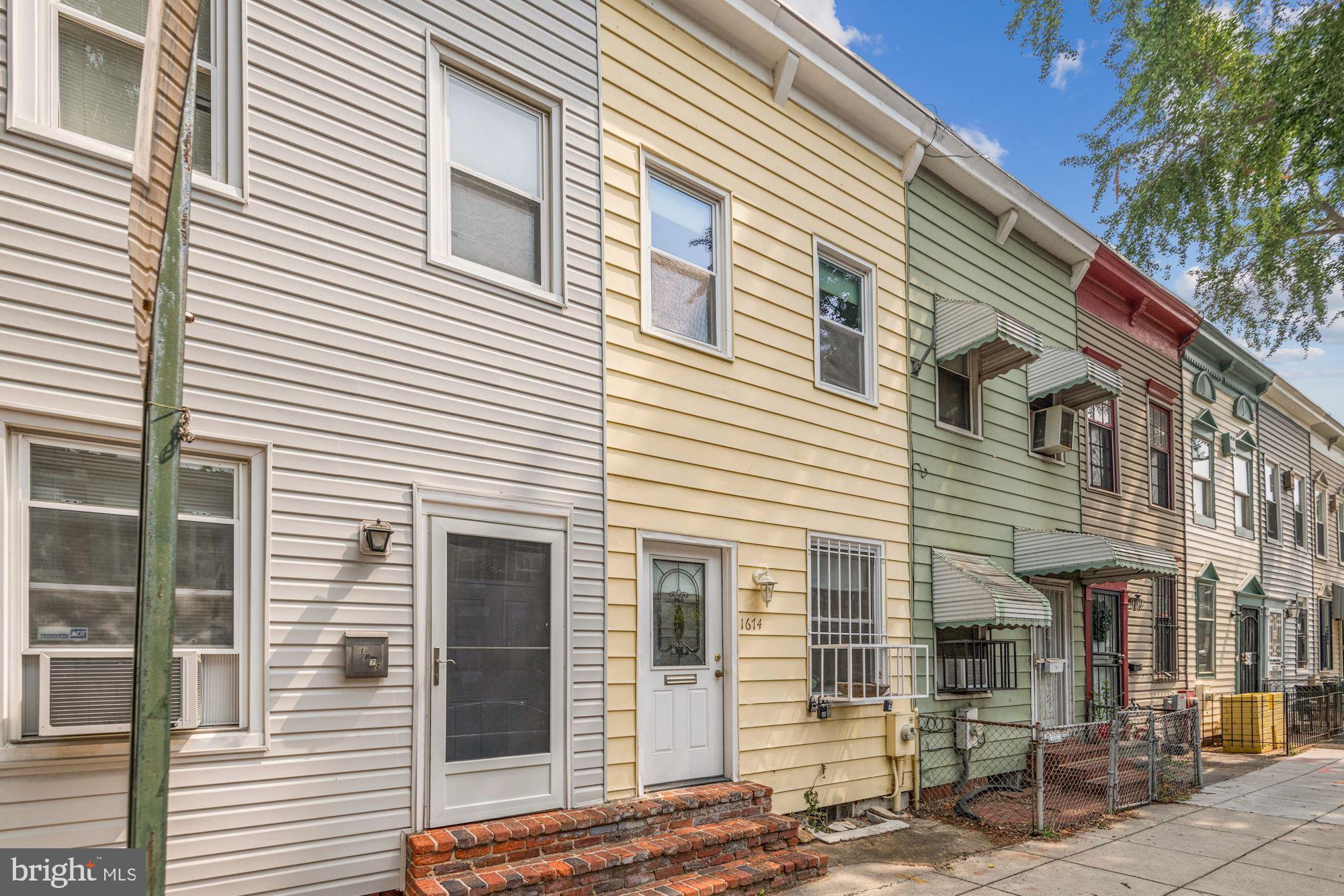 1674 Kramer Street Northeast Washington, DC 20002 - Photo 2 of 28 Front exterior (yellow)