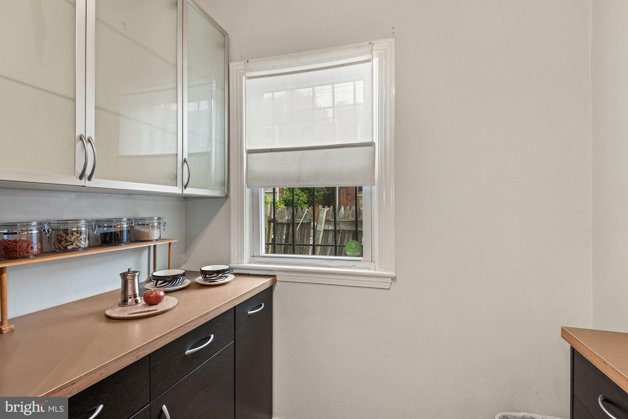 1674 Kramer Street Northeast Washington, DC 20002 - Photo 11 of 28 Kitchen, with window view of patio