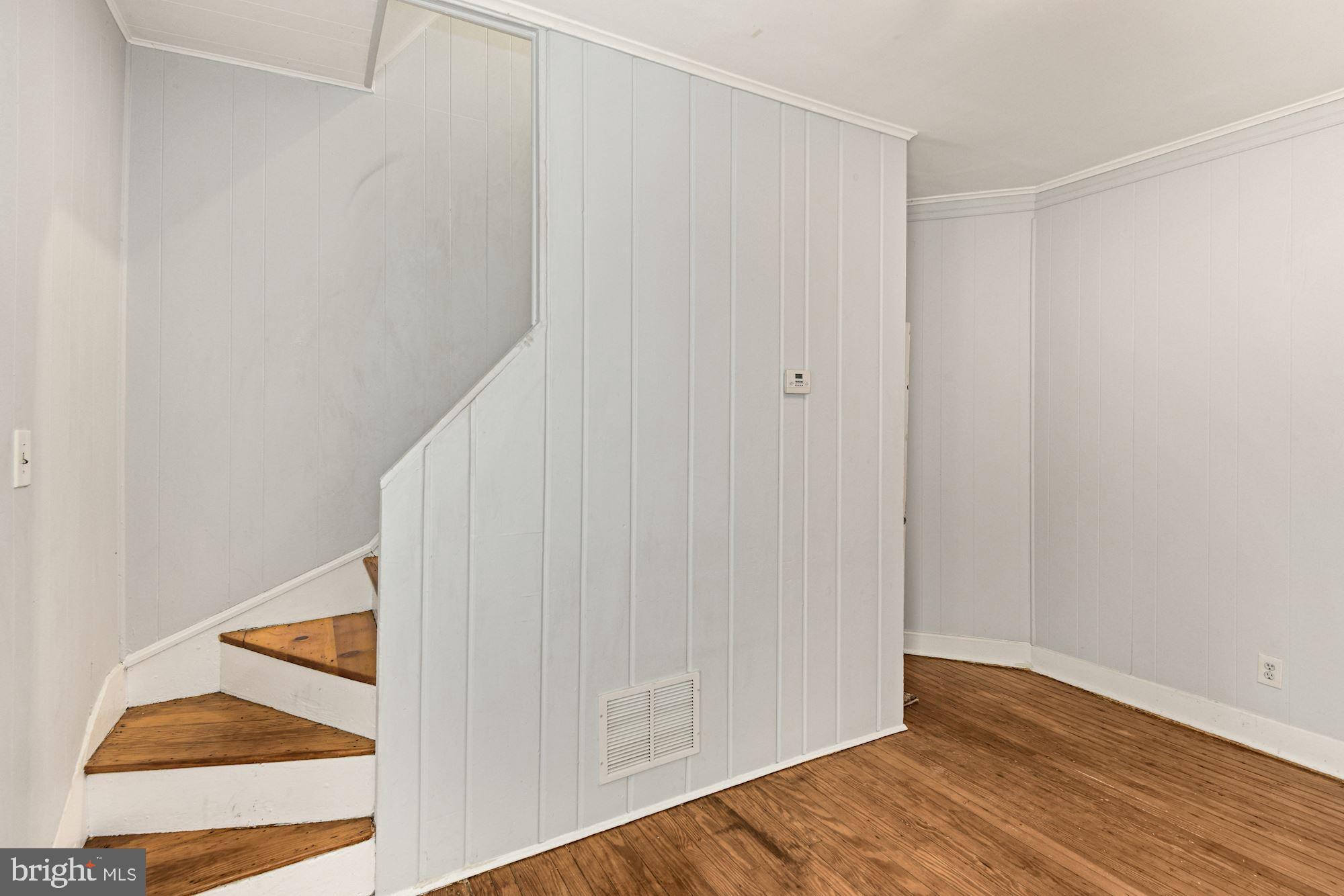 1674 Kramer Street Northeast Washington, DC 20002 - Photo 14 of 28 Staircase in dining room to upper level