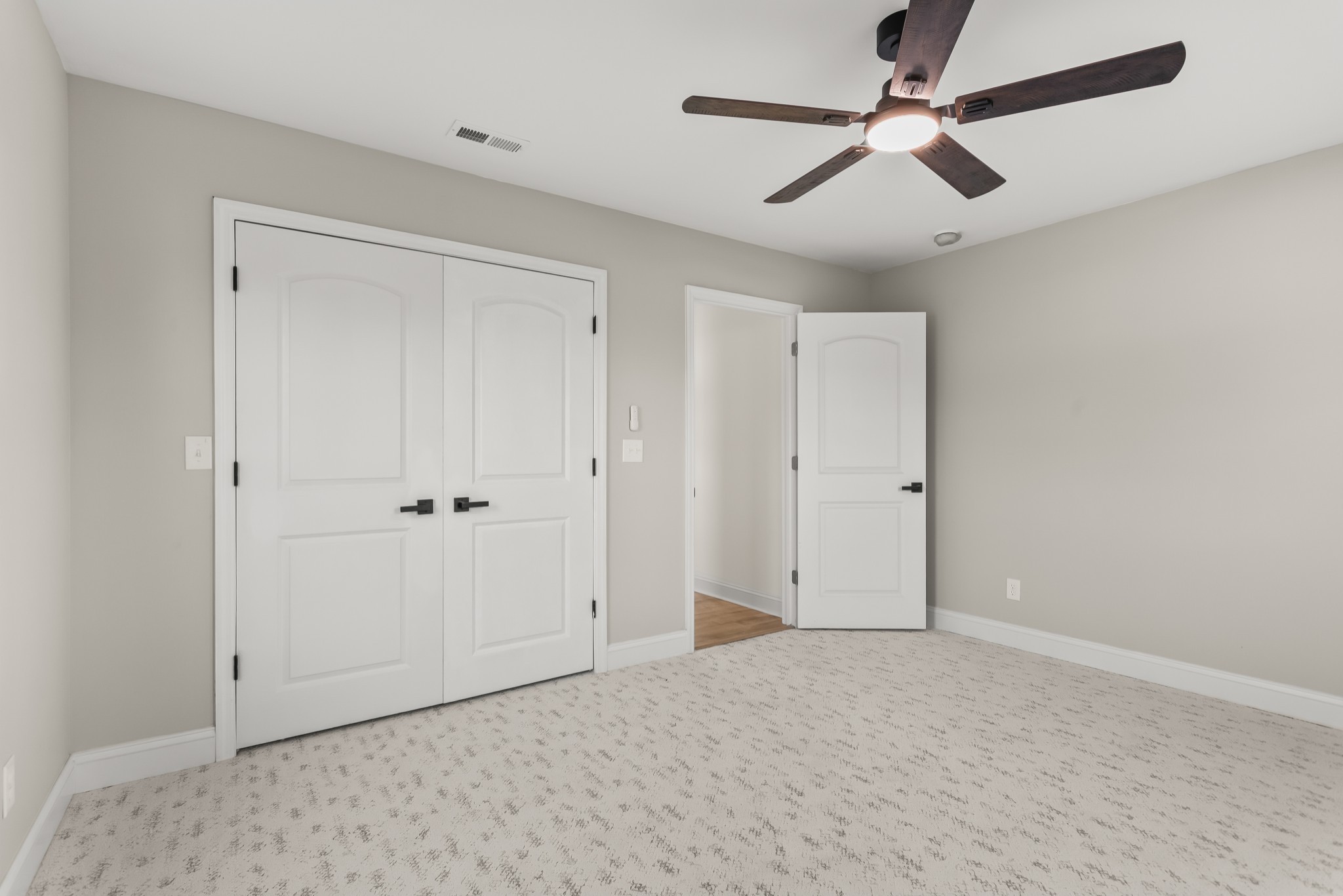 8637 Dog Branch Road Mount Pleasant, TN 38474 - Photo 17 of 41 a view of a livingroom with a ceiling fan