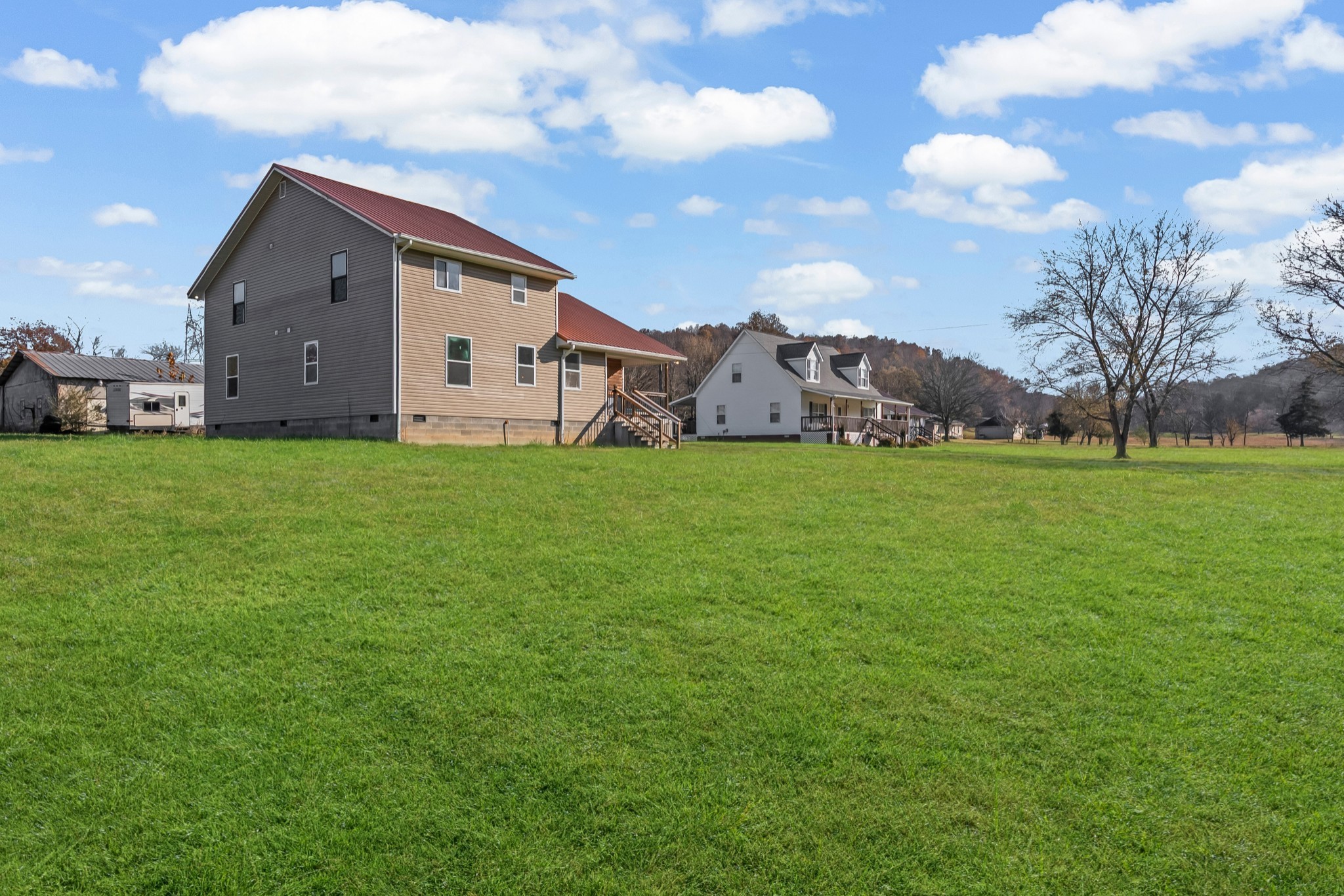 8637 Dog Branch Road Mount Pleasant, TN 38474 - Photo 37 of 41 a view of a house with a yard