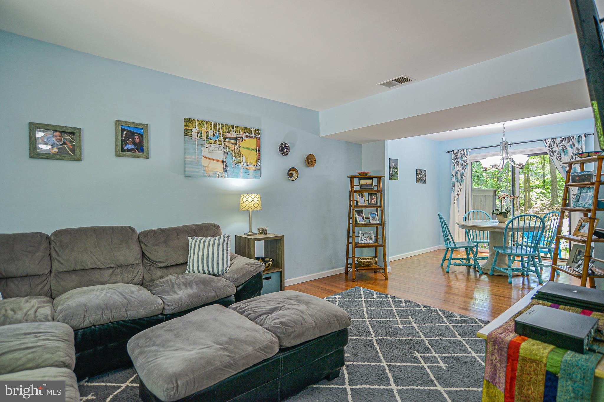 2410 Cloudcroft Square Reston, VA 20191 - Photo 5 of 26 Open Living & Dining Rooms w/ Ample Natural Light