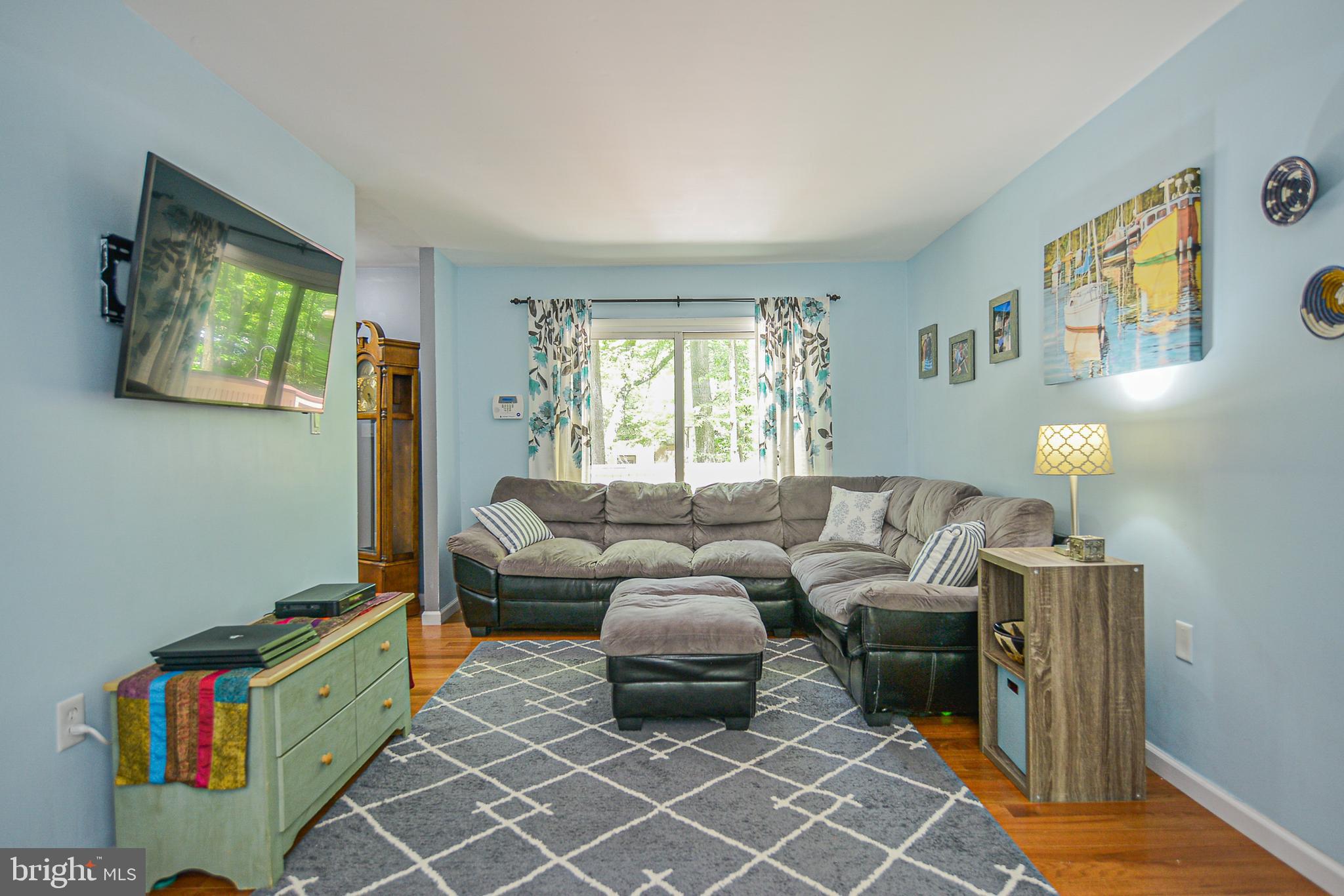 2410 Cloudcroft Square Reston, VA 20191 - Photo 6 of 26 Sliding Glass Door & Hardwoods in Living Room