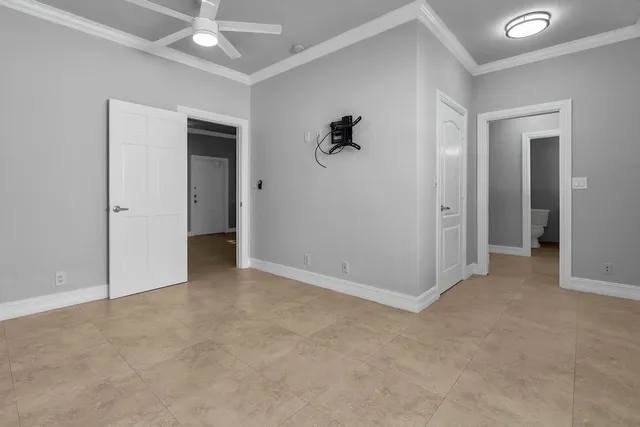 an empty room with a bathroom