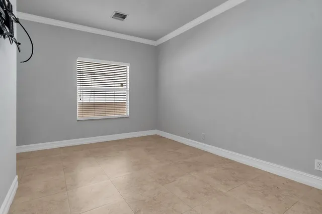 an empty room with a window